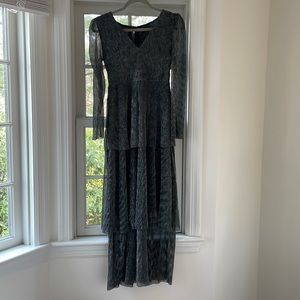 High waisted black and silver tiered gown
